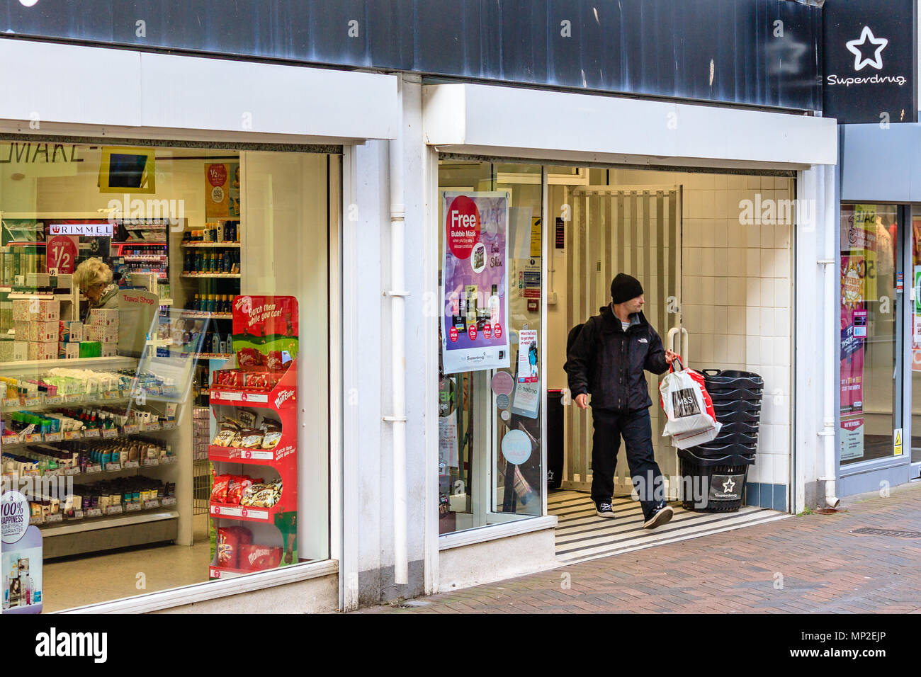 Walking Out Of A Shop High Resolution Stock Photography And Images Alamy