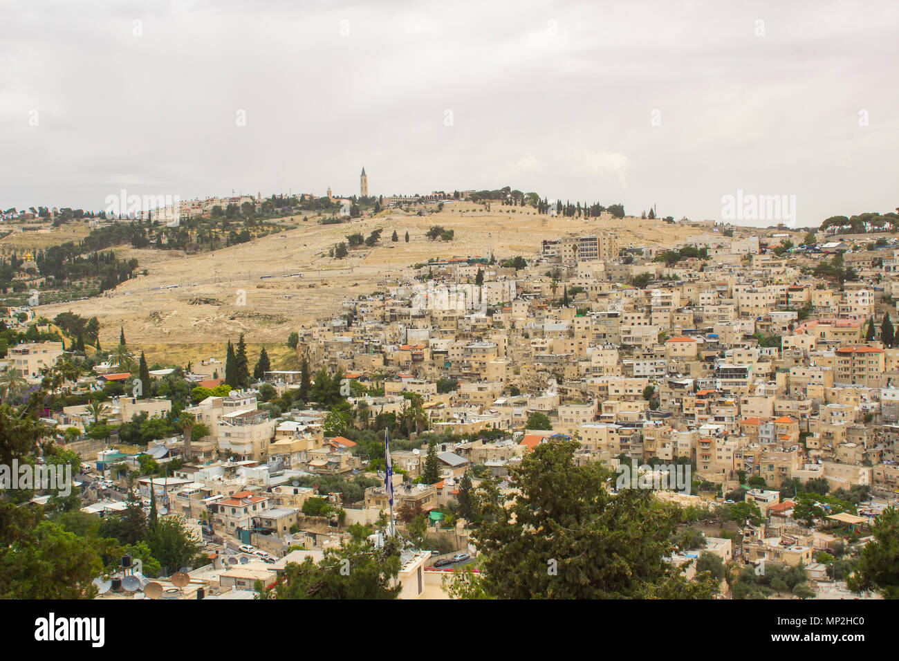 A view of the city of Jerusalem with in dense housing from the rooftop of the ancient Herod's Palace where Jesus Christ was ill treated. Stock Photo