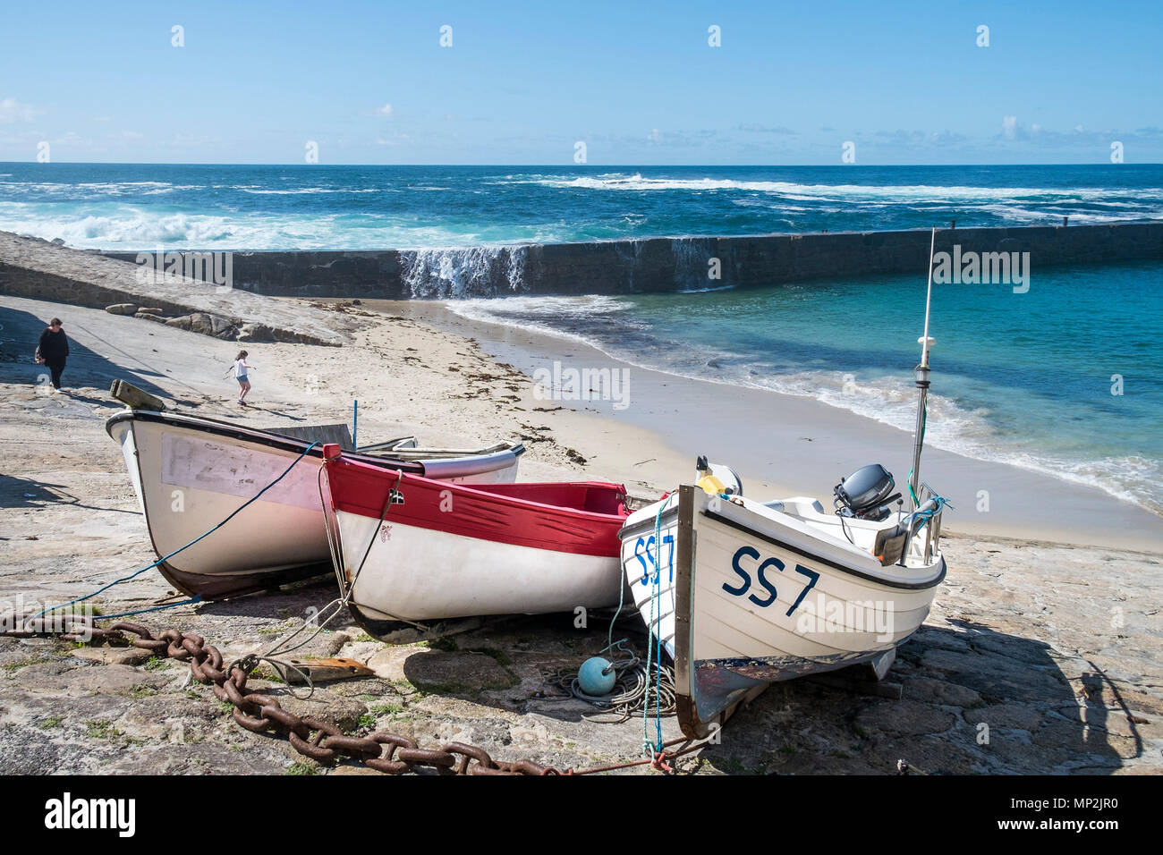 Small fishing boats on the slipway at Sennen Cove in Cornwall. Stock Photo