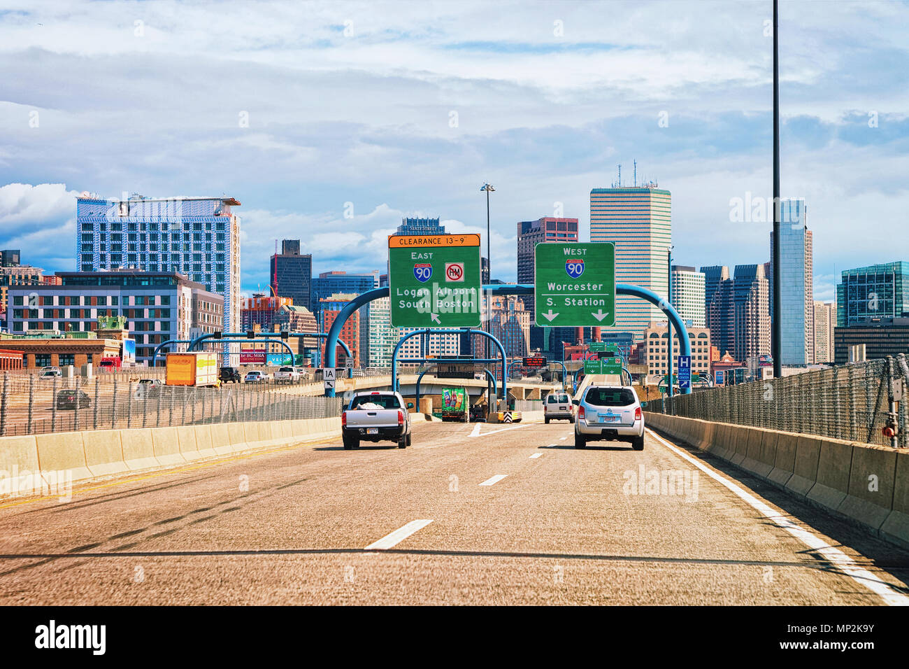 Boston, USA April 29, 2015 Cars on the road at Boston skyline, MA