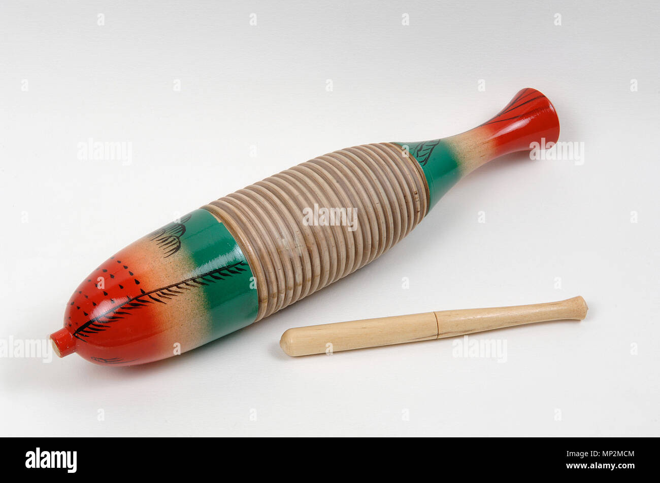 a guiro, percussion musical instrument Stock Photo - Alamy