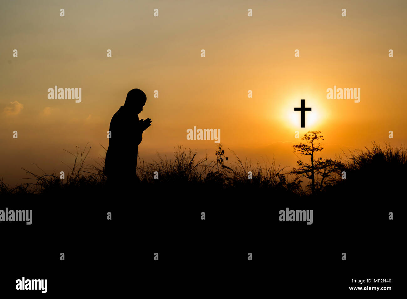 cross, silhouette, man, christian, praying, religion, worship, prayer, god, sunset, faith, hope, jesus, sky, pray, praise, christianity, background, c Stock Photo
