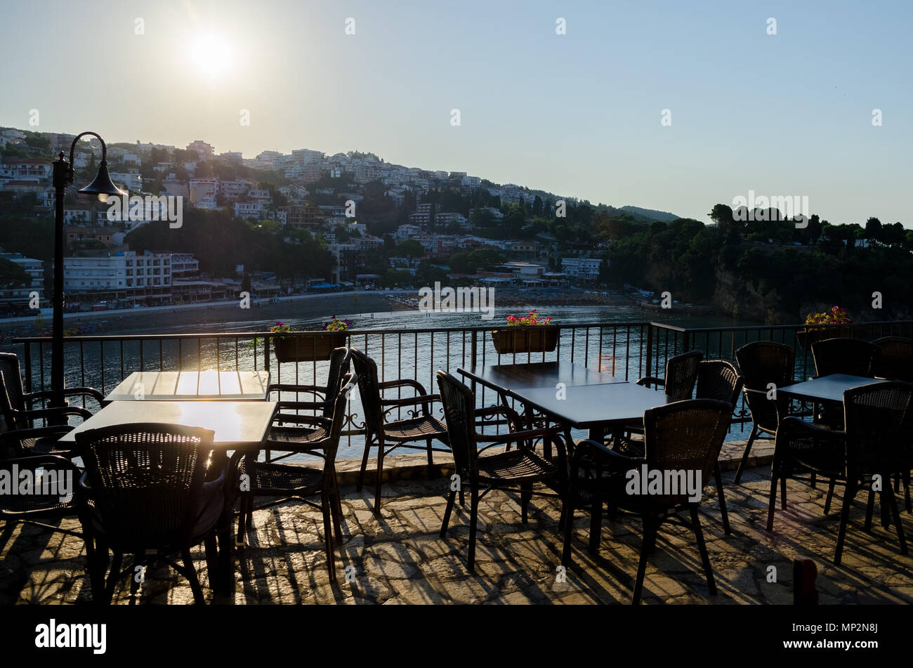 Cafe with beautiful sea view serving the local cuisine. Cozy bar restaurant at the old town of Ulcinj, Montenegro. Stock Photo