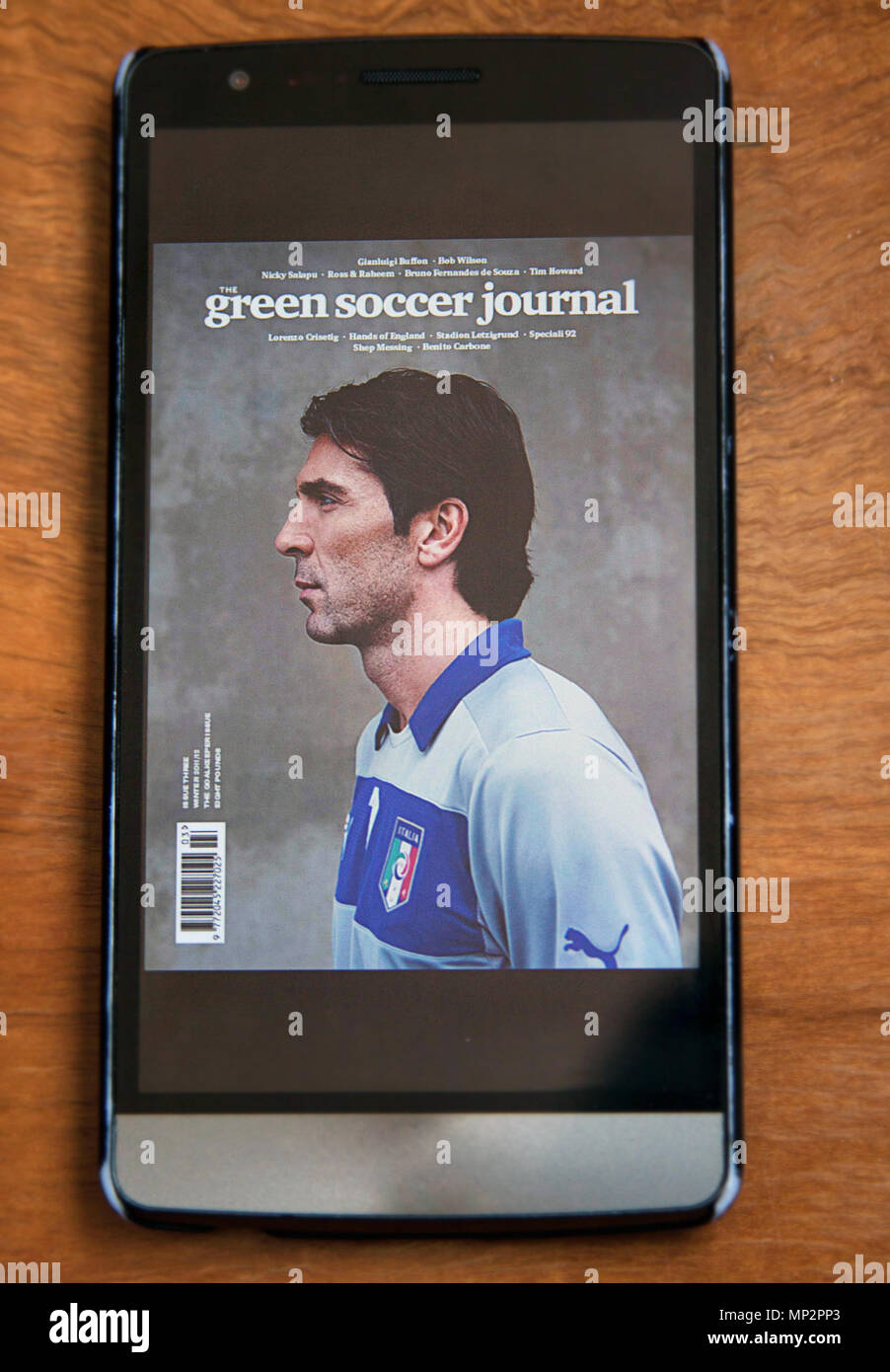 Goalkeeper Gianluigi Buffon on Cover of Green Soccer Journal magazine on Smartphone. Stock Photo