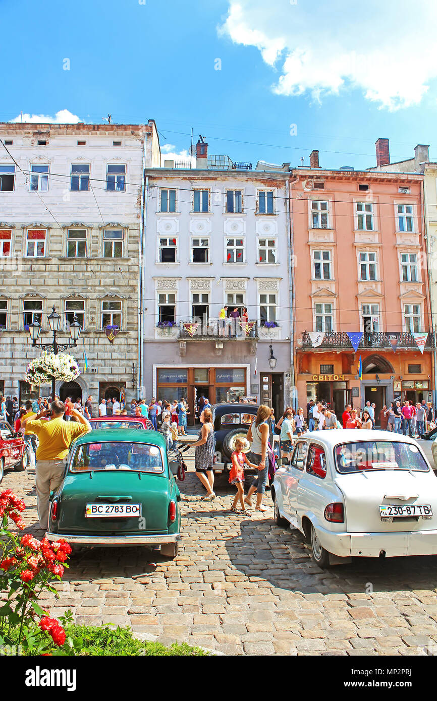 LVIV, UKRAINE JUNE 28, 2014 Retro cars on Market square in Lviv on