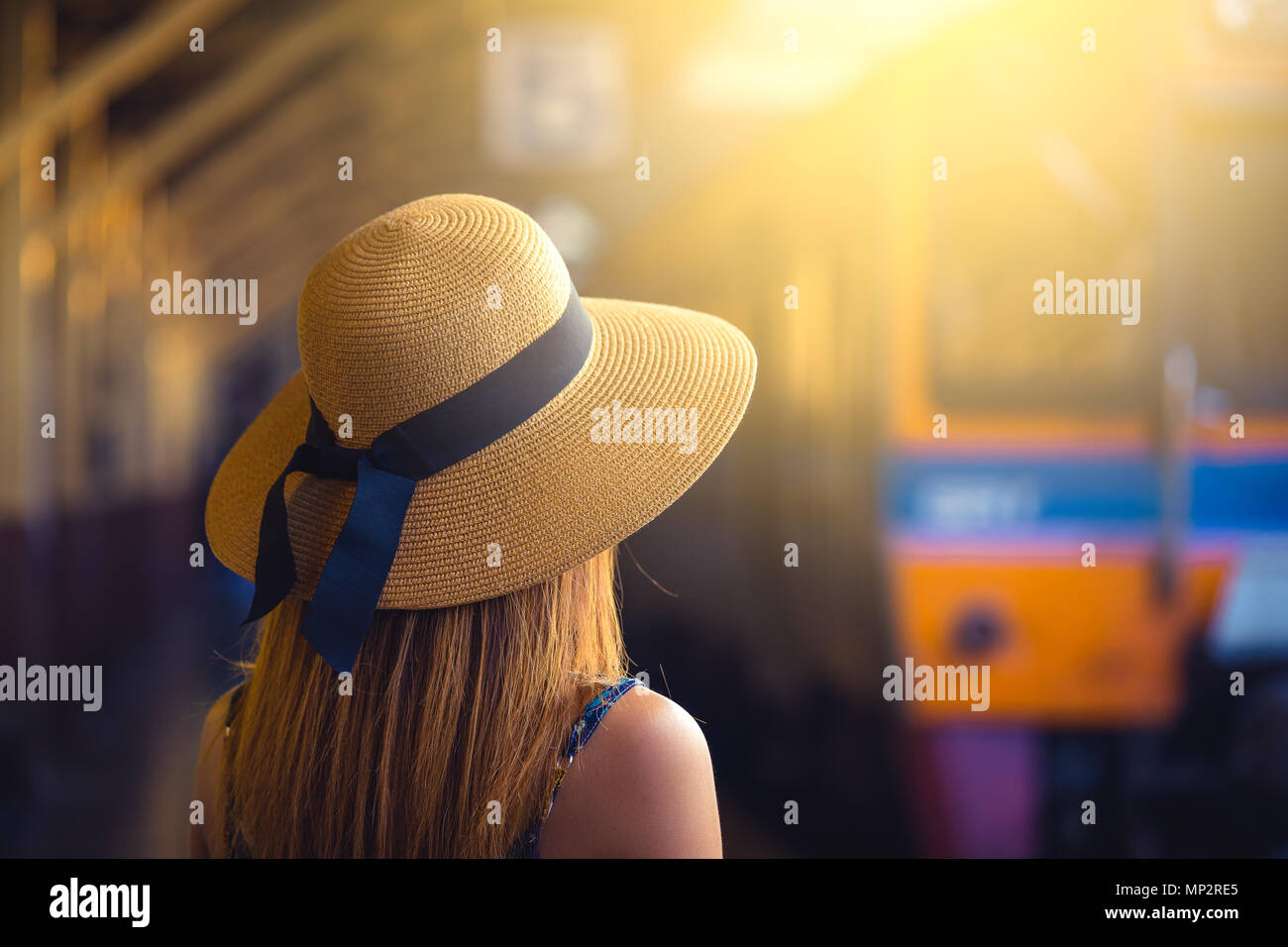 Woman waiting train hi-res stock photography and images - Alamy