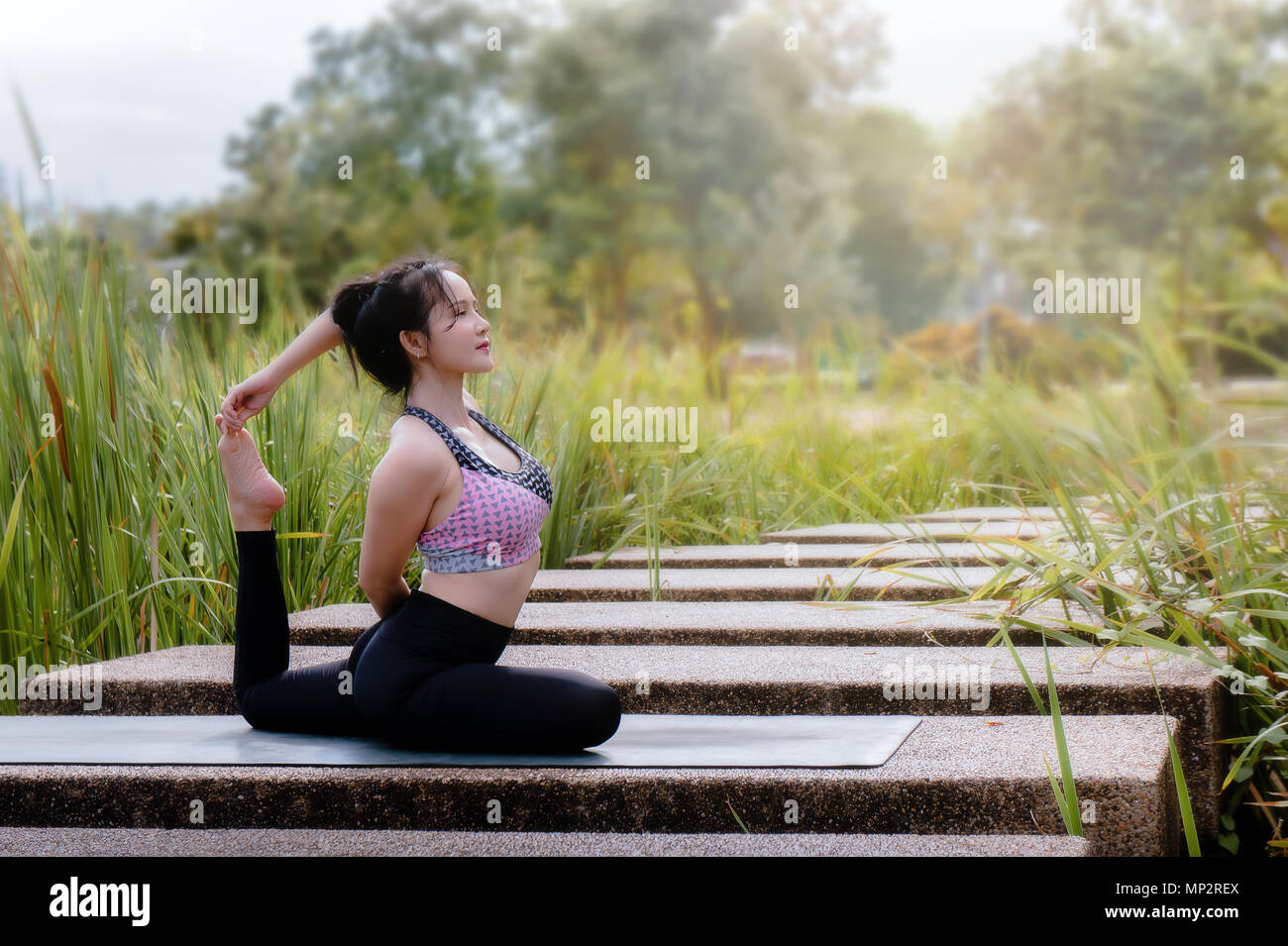 Yoga girl In the morning time Strengthen the concentration of skin, health  and good health is a good exercise Stock Photo - Alamy