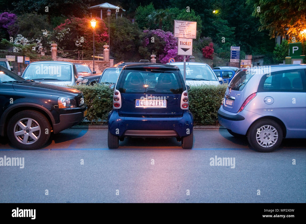 A Smartcar can create its own parking spot.  Bellagio, Italy. Stock Photo