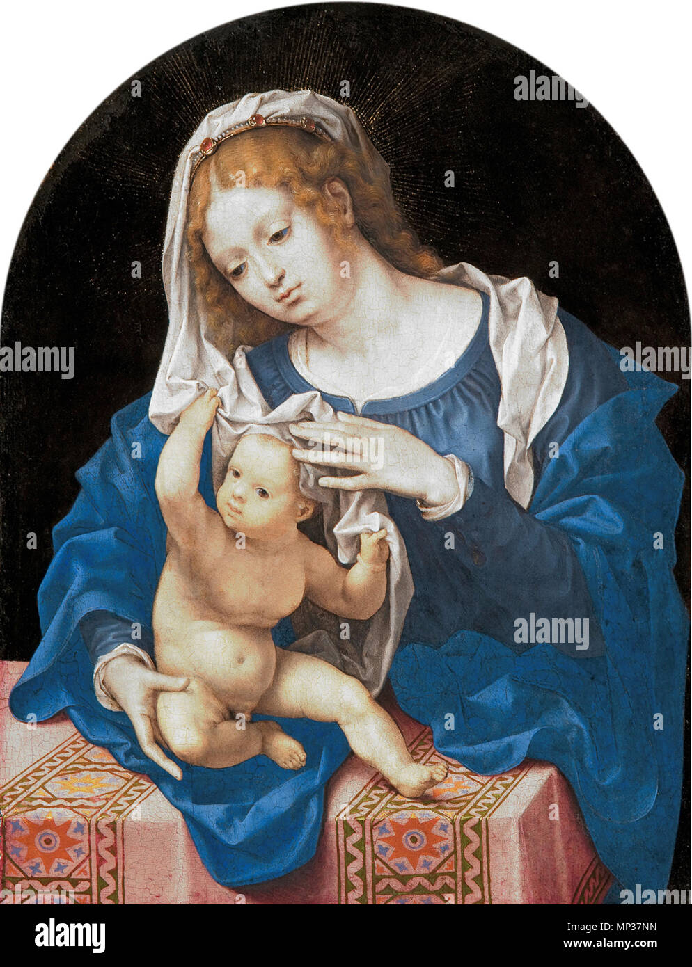 Madonna and Child *oil on panel *25,4 x 19,3 cm *circa 1520   Madonna and Child.. Madonna and Child. The German art historian Max Jakob Friedländer discovered more than 20 period copies of a now-lost original by Gossaert from 1520 (See Other versions below). circa 1520.   698 Jan Gossaert - madonna met kind - Mauritshuis Stock Photo