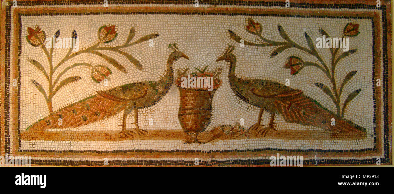 SAMSUNG DIGITAL CAMERA    . English: Doorways mosaic showing two peacocks facing each other on either side of a vase. Kelibia. Fourth century AD. Français : Mosaïque de seuil représentant deux paons s'affrontant de part et d'autre d'un vase. Kélibia. IVe siècle après J.-C. 29 October 2010. Habib M’henni   This photograph was made by Habib M’henni (User:Dyolf77) and released under the license(s) stated above. You are free to use it for any purpose as long as you credit me and follow the terms of the license.  English: Credits to Habib M’henni / Wikimedia Commons Français: Crédits à Habib M’henn Stock Photo