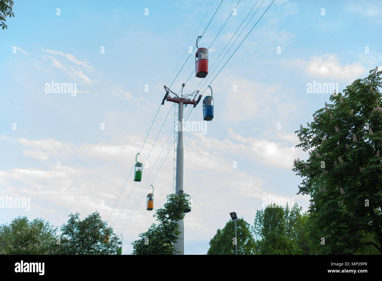 Cabin of the cable car against blue sky Stock Photo - Alamy