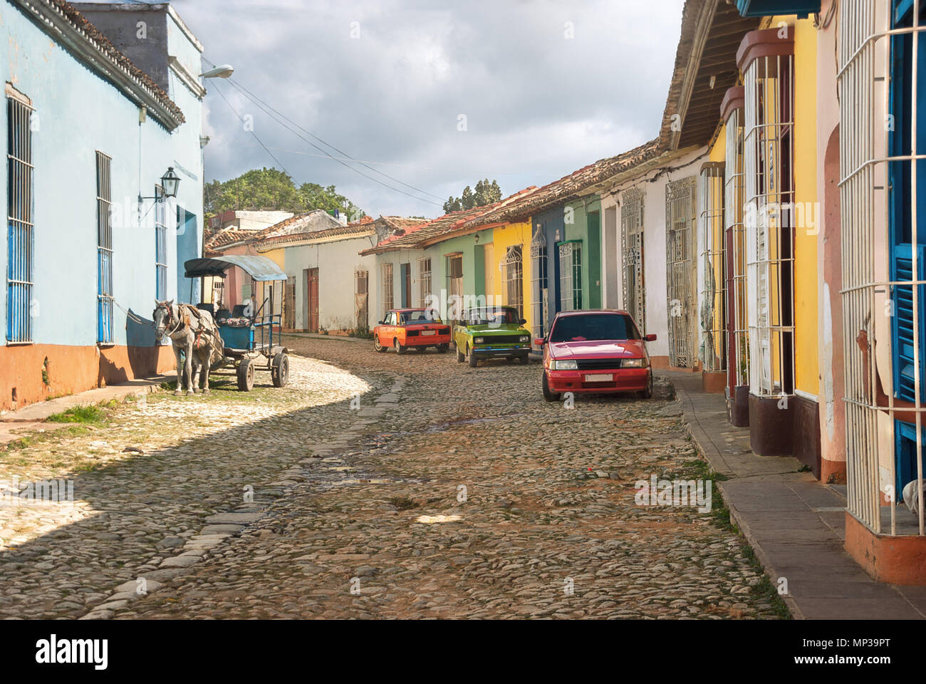 Colored facades of colonial buildings on the streets of Latin American Trinidad. Stock Photo
