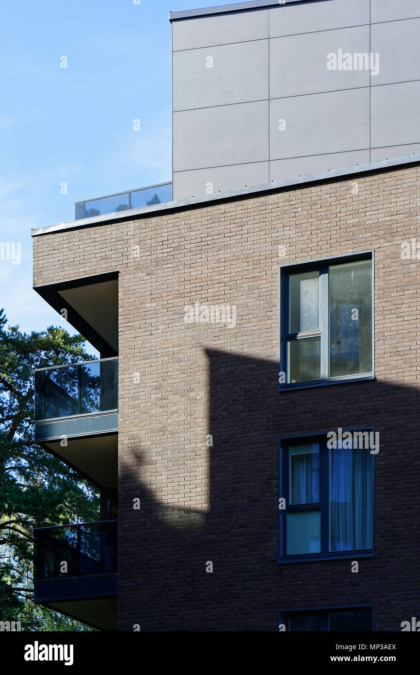 View of Modern glass apartment residential building with trees Stock Photo - Alamy