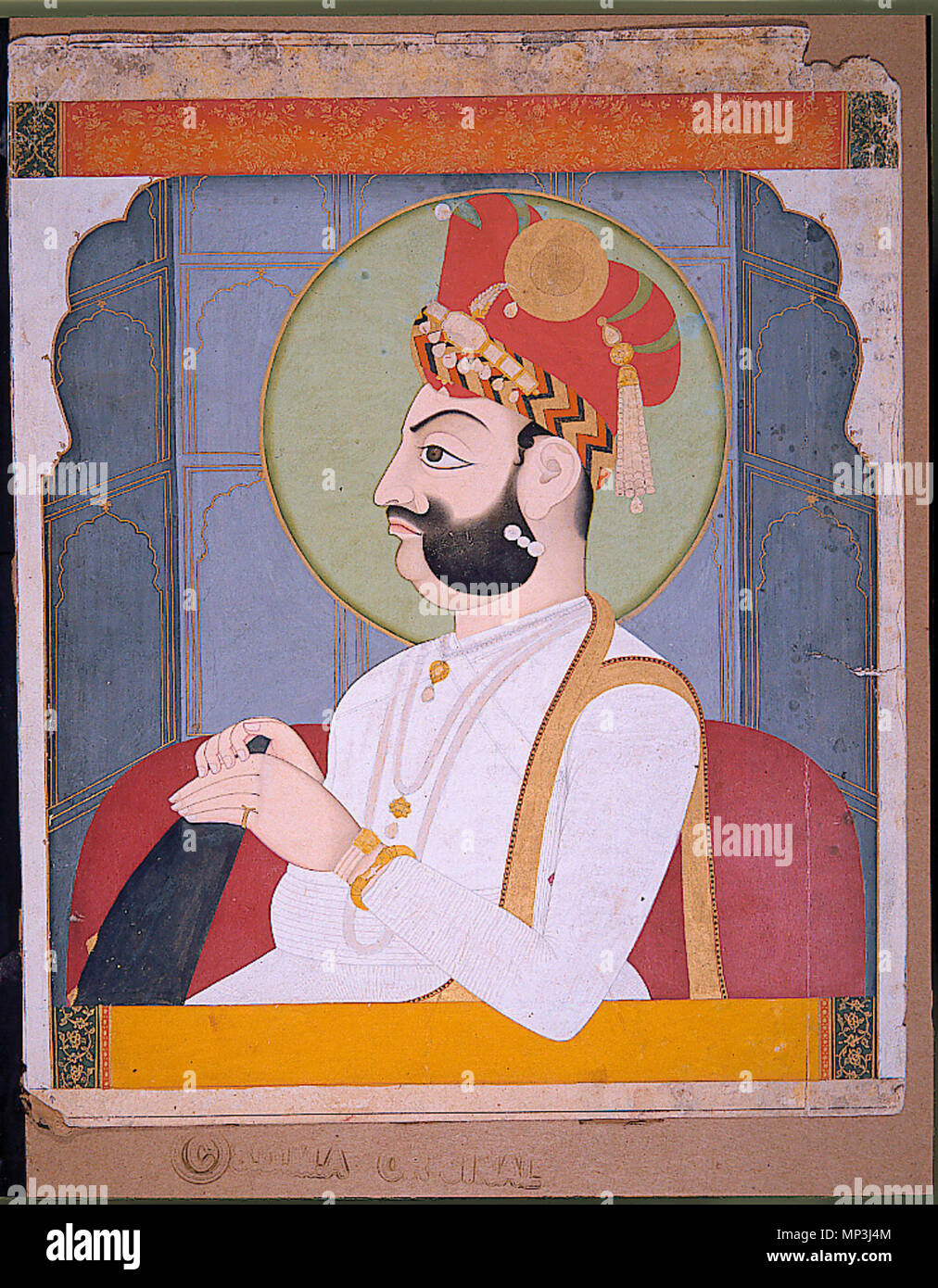 Dildo bilan etuk ayolning fotosurati