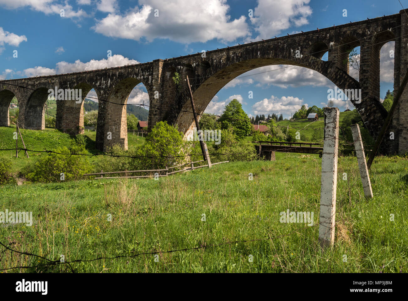 Old railway bridge, old viaduct Vorohta, Ukraine. Carpathian Mountains, wild mountain landscape Stock Photo