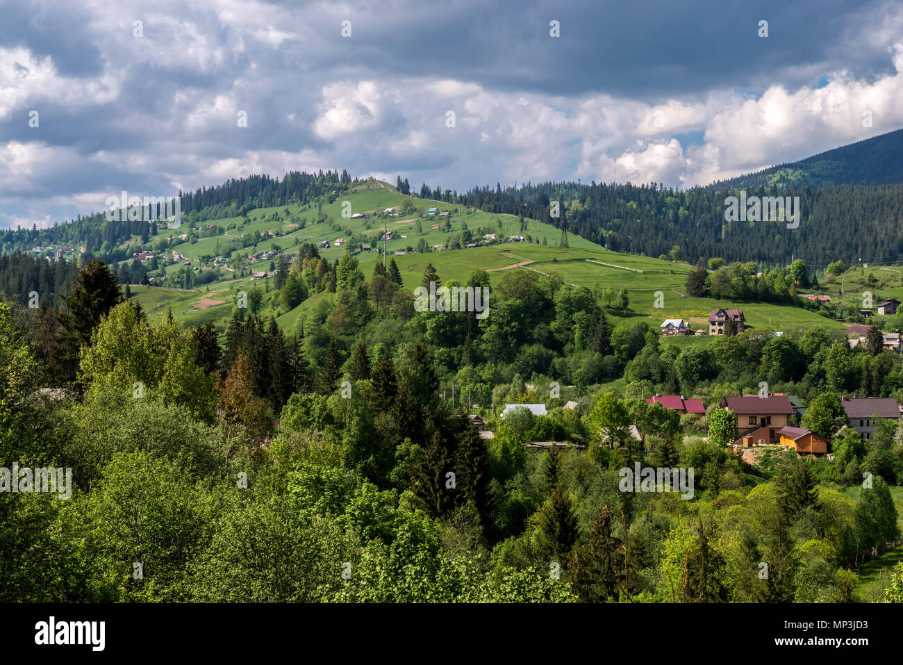 Aerial view of Carpathian mountains in summer. Village in the mountains ...