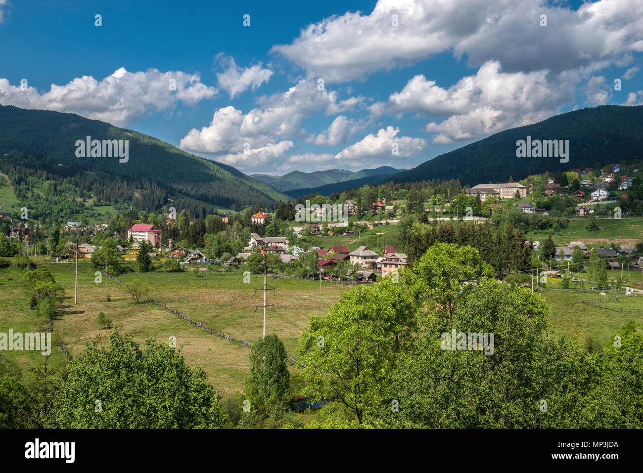 Aerial view of Carpathian mountains in summer. Village in the mountains ...
