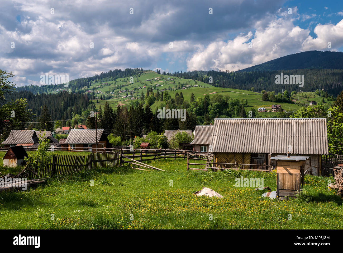 Aerial view of Carpathian mountains in summer. Village in the mountains ...