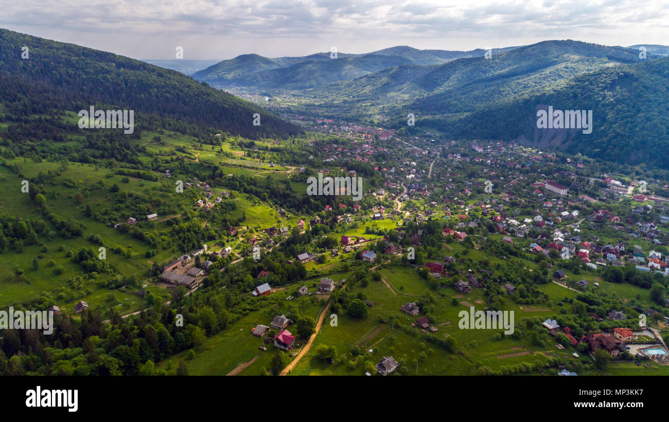 Aerial view of Carpathian mountains in summer. Village in the mountains ...