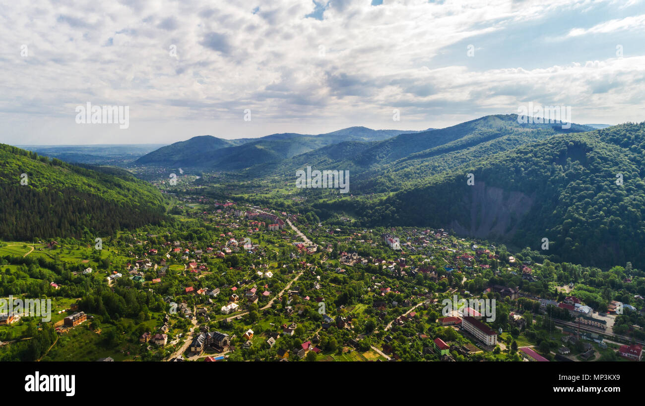 Aerial view of Carpathian mountains in summer. Village in the mountains ...