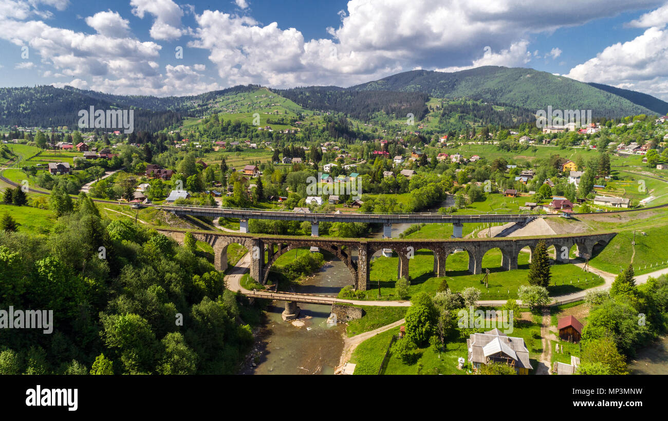 Aerial view of Carpathian mountains in summer. Village in the mountains ...