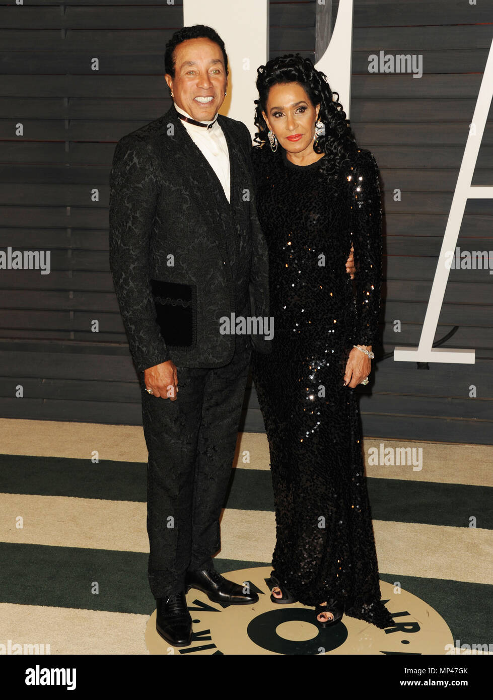 Frances Robinson, Smokey Robinson 409 at the 2015 Vanity Fair Oscars party at the Wallis Annenberg Center for the Performing Arts on February 22, 2015 in Beverly Hills, Frances Robinson, Smokey Robinson 409 ------------- Red Carpet Event, Vertical, USA, Film Industry, Celebrities,  Photography, Bestof, Arts Culture and Entertainment, Topix Celebrities fashion /  Vertical, Best of, Event in Hollywood Life - California,  Red Carpet and backstage, USA, Film Industry, Celebrities,  movie celebrities, TV celebrities, Music celebrities, Photography, Bestof, Arts Culture and Entertainment,  Topix, ve Stock Photo
