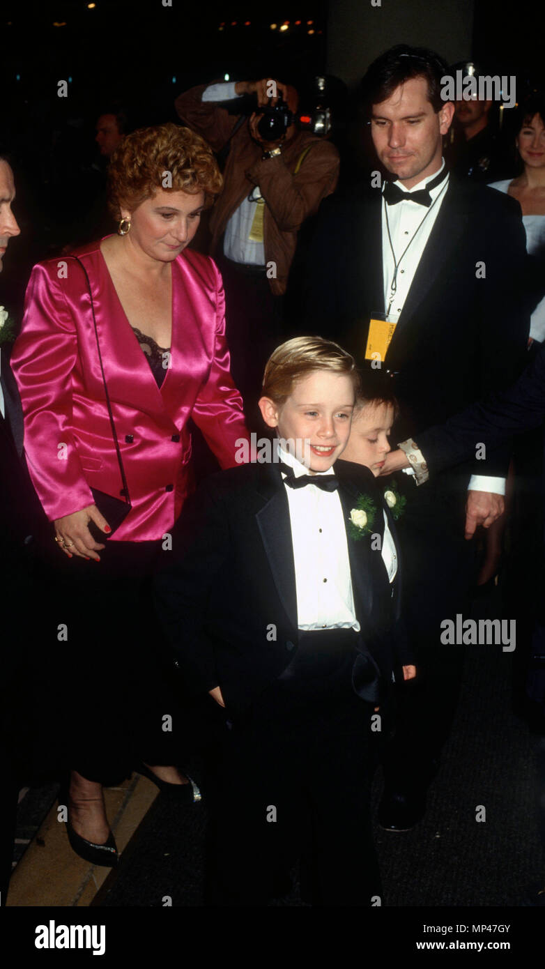 BEVERLY HILLS, CA - JANUARY 19: Actor Macaulay Culkin and family attend the 48th Annual Golden Globe Awards on January 19, 1991 at the Beverly Hilton Hotel in Beverly Hills, California. Photo by Barry King/Alamy Stock Photo Stock Photo