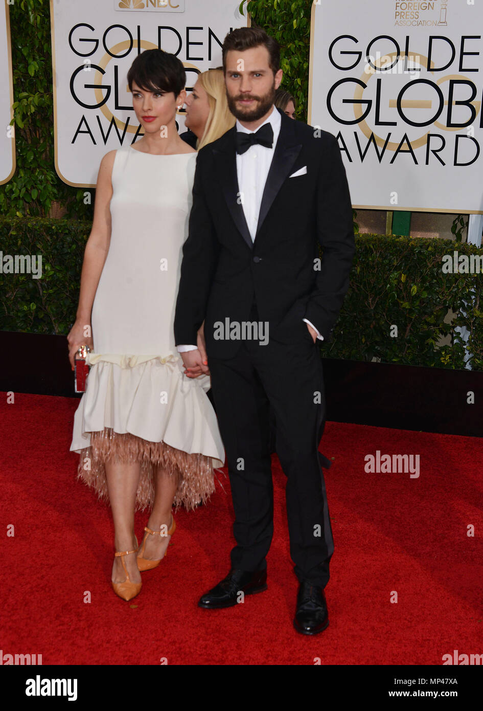 Jamie Dornan and Amelia Warner at the 72th Golden Globes Awards 2015 at the  Beverly Hilton in Los Angeles. January 11, 2015Jamie Dornan and Amelia  Warner ------------- Red Carpet Event, Vertical, USA,