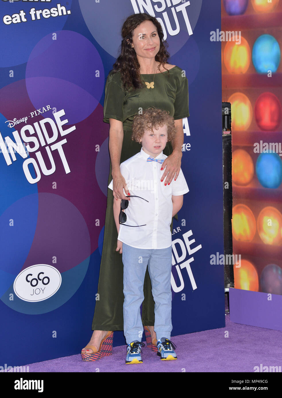 Minnie Driver and son Henry Story Driver 117 at the  Inside Out Premiere at the El Capitan Theatre in Los Angeles. June, 8, 2015.Minnie Driver and son Henry Story Driver 117 ------------- Red Carpet Event, Vertical, USA, Film Industry, Celebrities,  Photography, Bestof, Arts Culture and Entertainment, Topix Celebrities fashion /  Vertical, Best of, Event in Hollywood Life - California,  Red Carpet and backstage, USA, Film Industry, Celebrities,  movie celebrities, TV celebrities, Music celebrities, Photography, Bestof, Arts Culture and Entertainment,  Topix, vertical,  family from from the yea Stock Photo