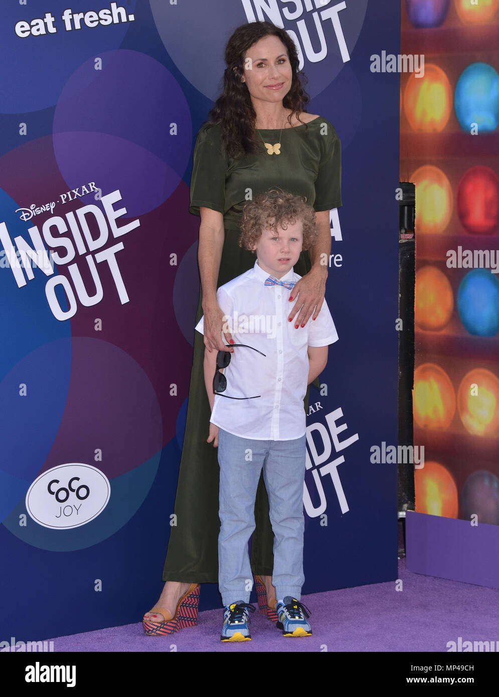 Minnie Driver and son Henry Story Driver 118 at the  Inside Out Premiere at the El Capitan Theatre in Los Angeles. June, 8, 2015.Minnie Driver and son Henry Story Driver 118 ------------- Red Carpet Event, Vertical, USA, Film Industry, Celebrities,  Photography, Bestof, Arts Culture and Entertainment, Topix Celebrities fashion /  Vertical, Best of, Event in Hollywood Life - California,  Red Carpet and backstage, USA, Film Industry, Celebrities,  movie celebrities, TV celebrities, Music celebrities, Photography, Bestof, Arts Culture and Entertainment,  Topix, vertical,  family from from the yea Stock Photo
