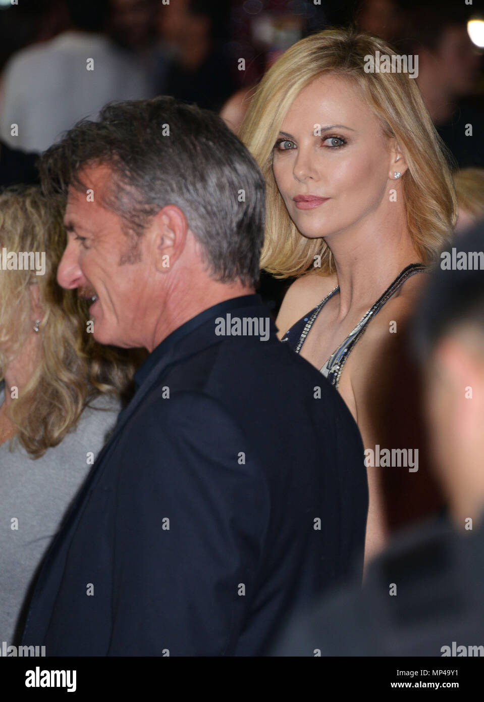 Sean Penn, Charlize Theron 026 at the Gunman Premiere at the Regal Theatre in Los Angeles.Sean Penn, Charlize Theron 026 ------------- Red Carpet Event, Vertical, USA, Film Industry, Celebrities,  Photography, Bestof, Arts Culture and Entertainment, Topix Celebrities fashion /  Vertical, Best of, Event in Hollywood Life - California,  Red Carpet and backstage, USA, Film Industry, Celebrities,  movie celebrities, TV celebrities, Music celebrities, Photography, Bestof, Arts Culture and Entertainment,  Topix, vertical,  family from from the year , 2015, inquiry tsuni@Gamma-USA.com Husband and wif Stock Photo