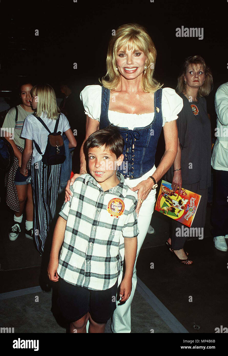 Anderson Loni and her son  - Anderson Loni and her son  Event in Hollywood Life - California, Red Carpet Event, USA, Film Industry, Celebrities, Photography, Bestof, Arts Culture and Entertainment, Topix Celebrities fashion, Best of, Hollywood Life, Event in Hollywood Life - California, Red Carpet and backstage, movie celebrities, TV celebrities, Music celebrities, Topix, Bestof, Arts Culture and Entertainment, vertical, one person, Photography,   Three Quarters, 1993 to 1999, inquiry tsuni@Gamma-USA.com , Credit Tsuni / USA,   === Red Carpet Event, USA, Film Industry, Celebrities, Photography Stock Photo