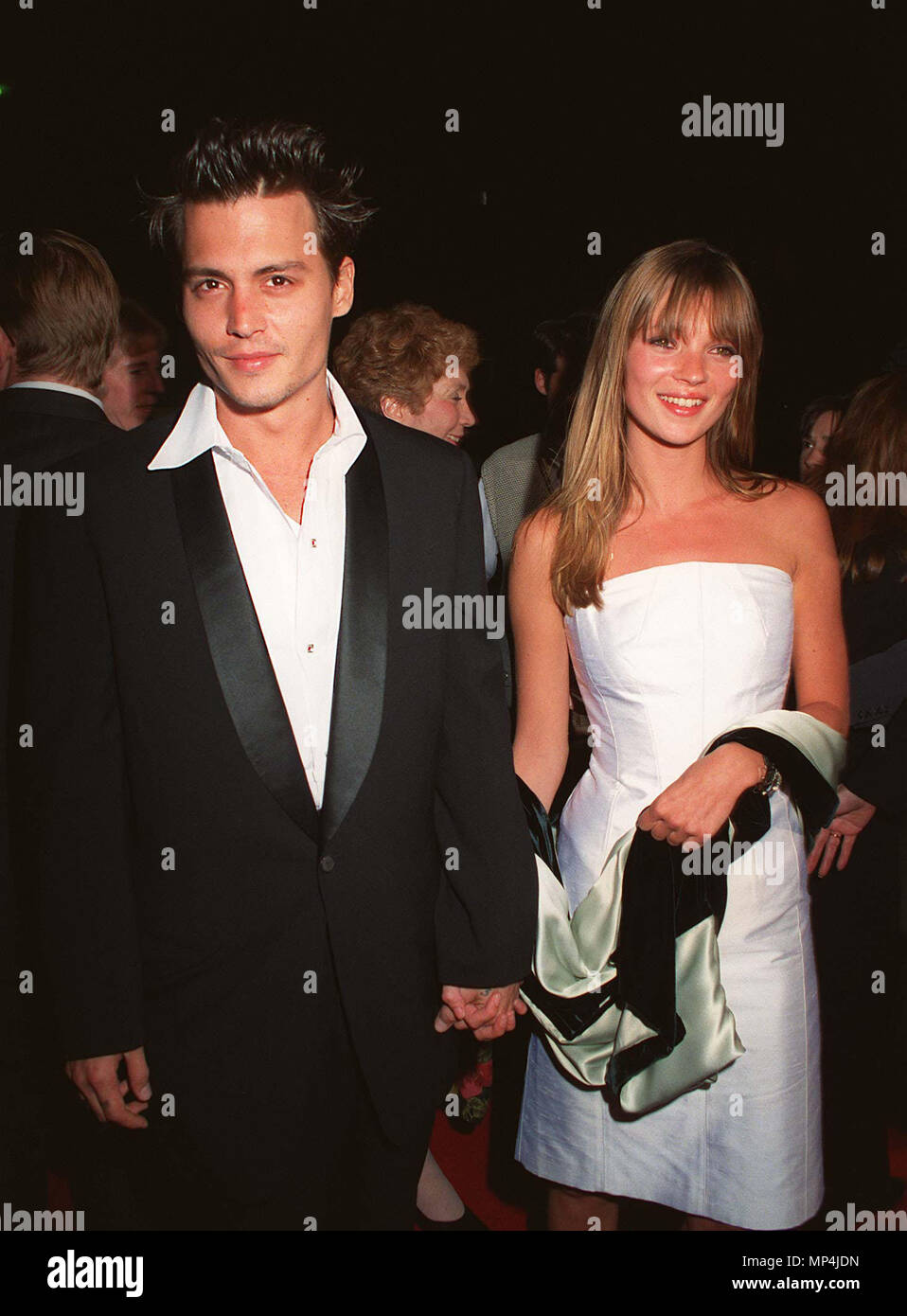 Depp Johnny and Moss Kate Depp- Johnny + Moss Kate  Event in Hollywood Life - California, Red Carpet Event, USA, Film Industry, Celebrities, Photography, Bestof, Arts Culture and Entertainment, Topix Celebrities fashion, Best of, Hollywood Life, Event in Hollywood Life - California, Red Carpet and backstage, movie celebrities, TV celebrities, Music celebrities, Topix, Bestof, Arts Culture and Entertainment, vertical, one person, Photography,   Three Quarters, 1993 to 1999, inquiry tsuni@Gamma-USA.com , Credit Tsuni / USA,   === Red Carpet Event, USA, Film Industry, Celebrities, Photography, Ar Stock Photo