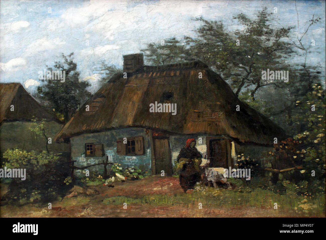 Cottage and Woman with Goat / Farmhouse in Nuenen (La Chaumiére)   Nuenen, June 1885 - July 1885.   1223 1885 van Gogh Bauernhaus in Nuenen anagoria Stock Photo