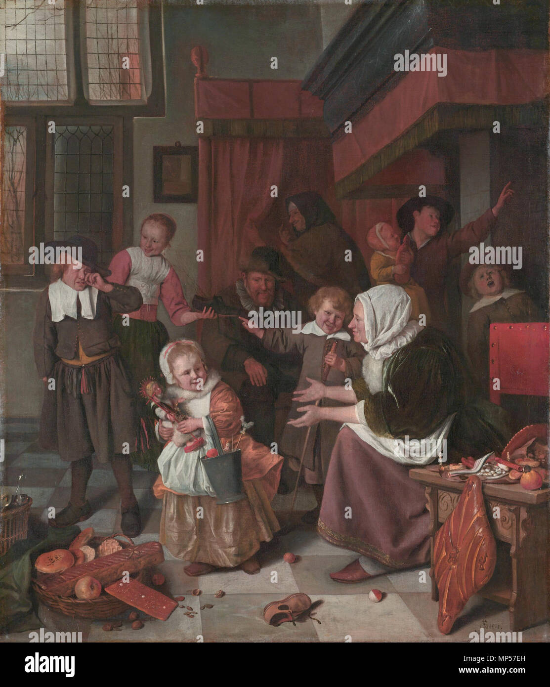 The Feast of Saint Nicholas  *oil on canvas  *82 x 70.5 cm  *1665 - 1668  *signed b.r.: JSteen Jan Steen - Het Sint Nicolaasfeest 701 Jan Steen – Het Sint-Nicolaasfeest Stock Photo