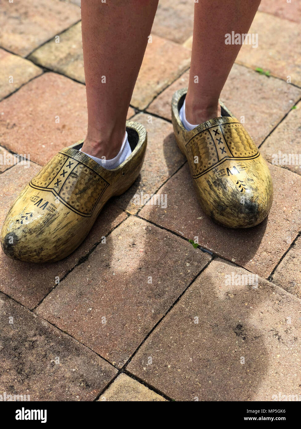 Close up of feet in wooden shoes Stock Photo - Alamy