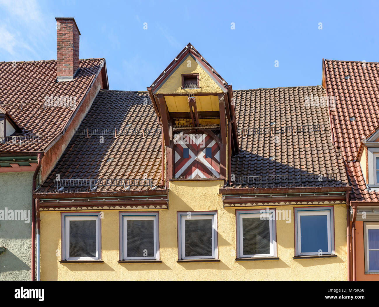 detail of dormer on old house roof, shot in bright spring light at Rottweil, Baden Wuttenberg, Germany Stock Photo