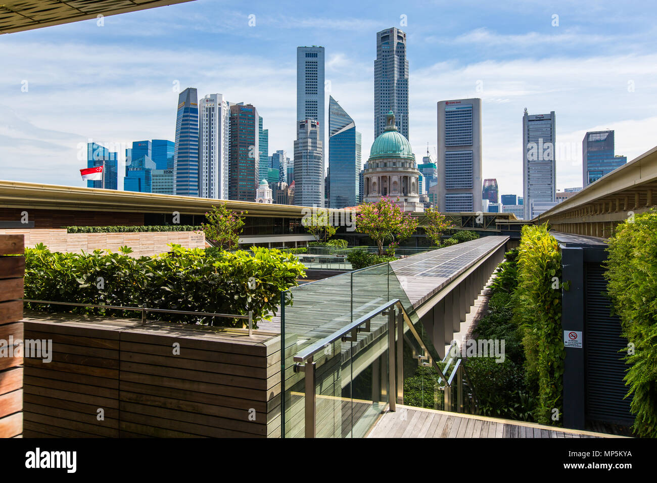 View of Singapore modern skyscrapers blend with the roof top of
