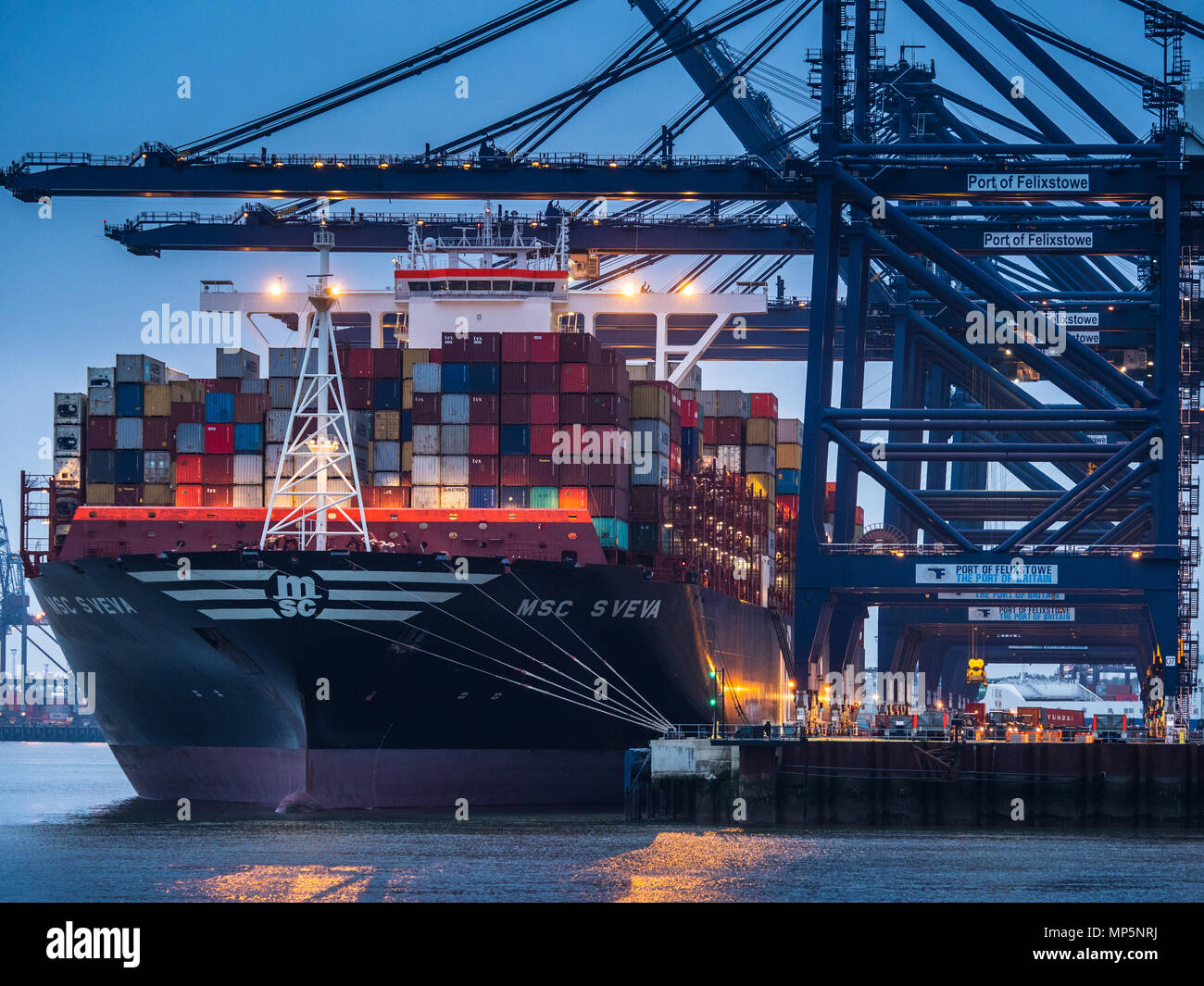 Global Trade - Shipping containers in transit between ports - Port of Felixstowe UK Stock Photo