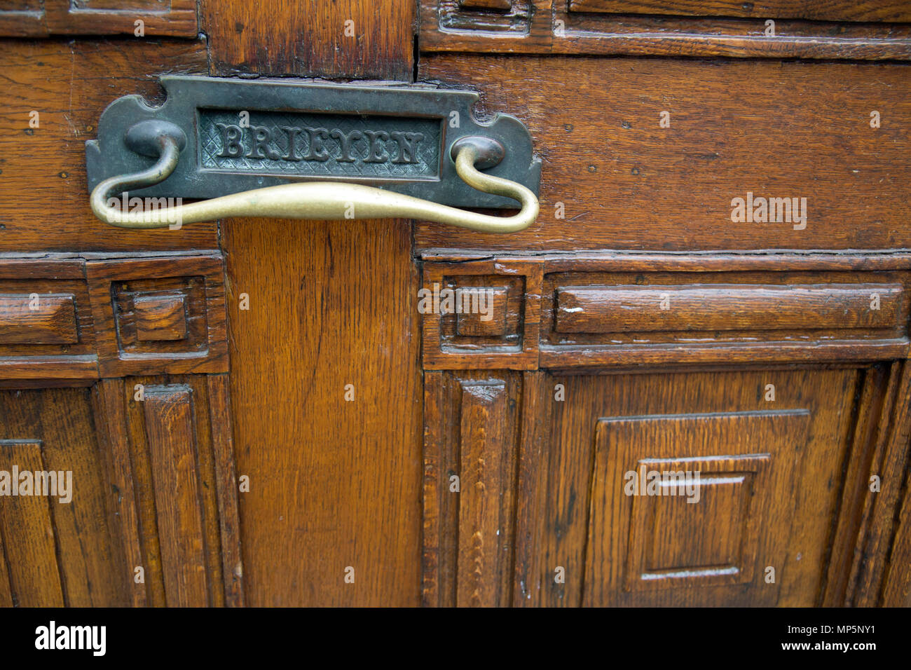 A metal letter slot in a door Stock Photo Alamy