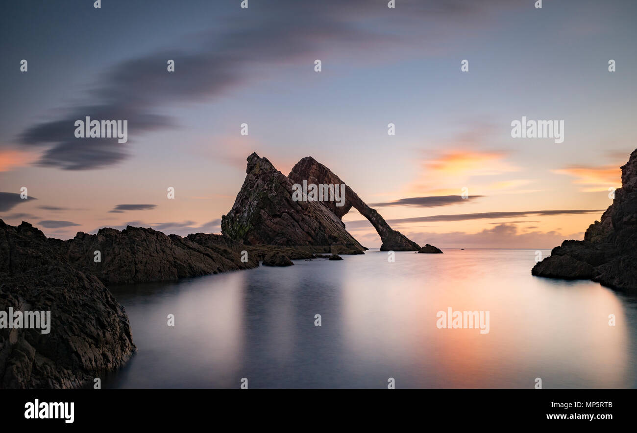 Scotland, UK landscape - Sunset at Bow Fiddle Rock on the Scottish coast at Portknockie, Moray, UK Stock Photo