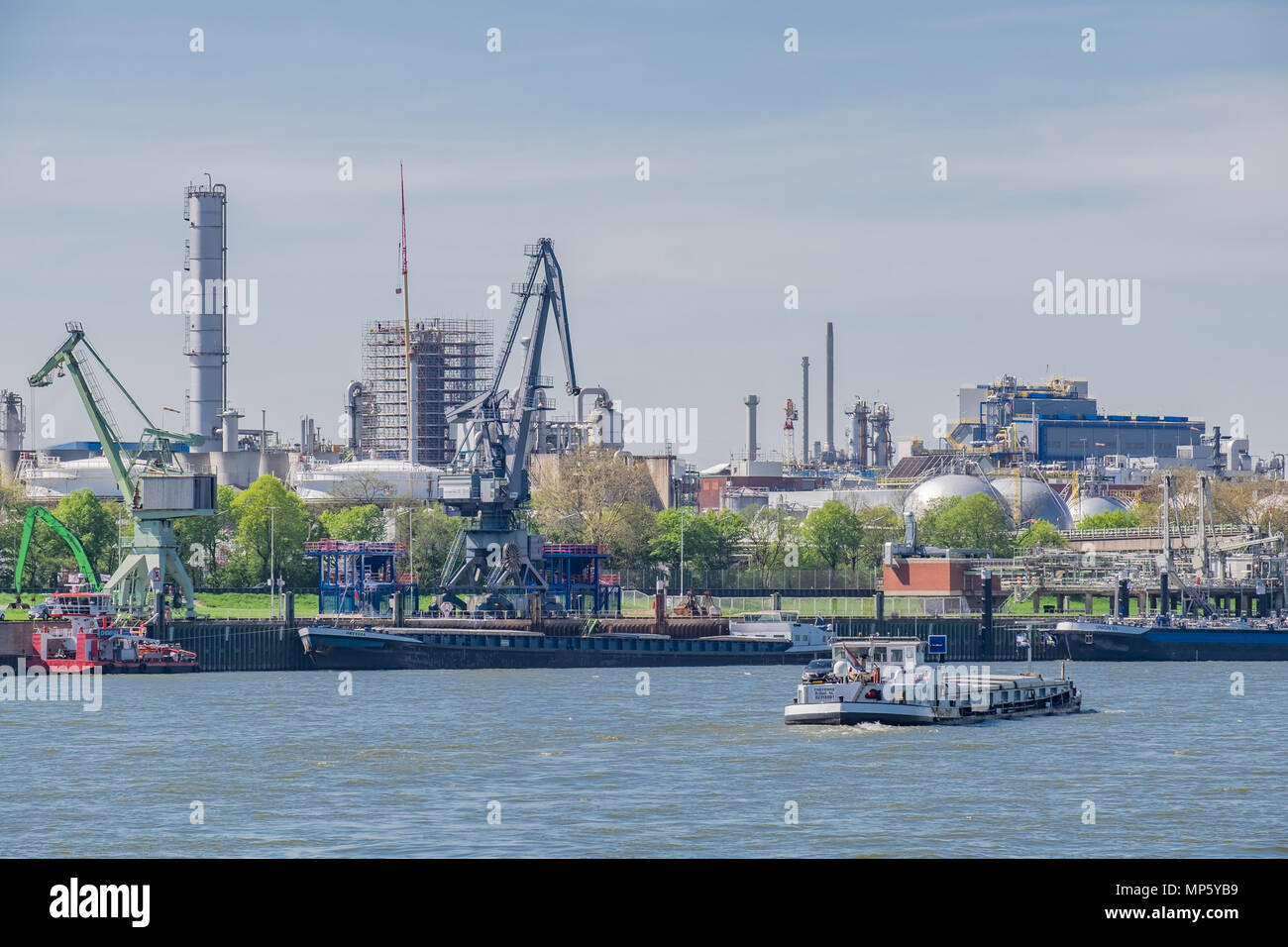 Large oil refinery on the Rhine River at the Port of Niehl. Stock Photo