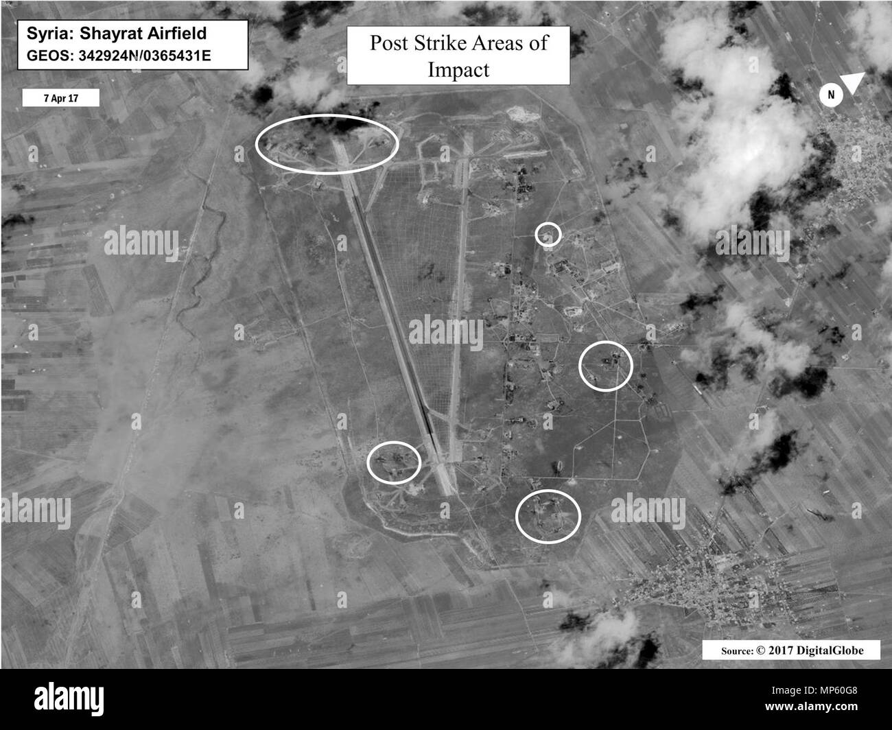 Battle damage assessment image of Shayrat Airfield, Syria,  following U.S. Tomahawk Land Attack Missile strikes April 7, 2017 from the  USS Ross (DDG 71) and USS Porter (DDG 78), Arleigh Burke-class  guided-missile destroyers. The United States fired Tomahawk missiles into  Syria in retaliation for the regime of Bashar Assad using nerve agents to  attack his own people. Stock Photo