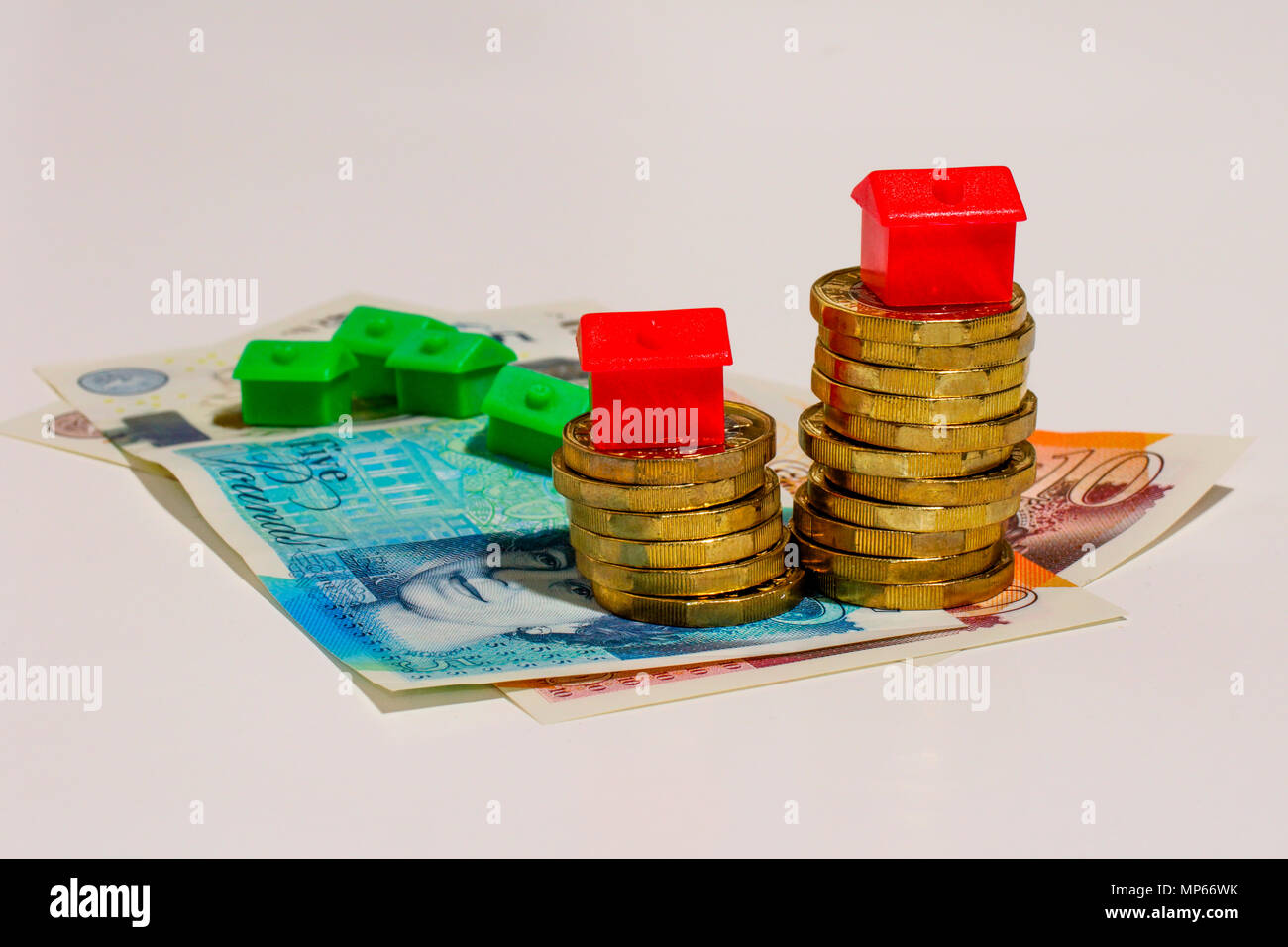 Financial Concept pictures, UK GBP and monopoly houses Stock Photo