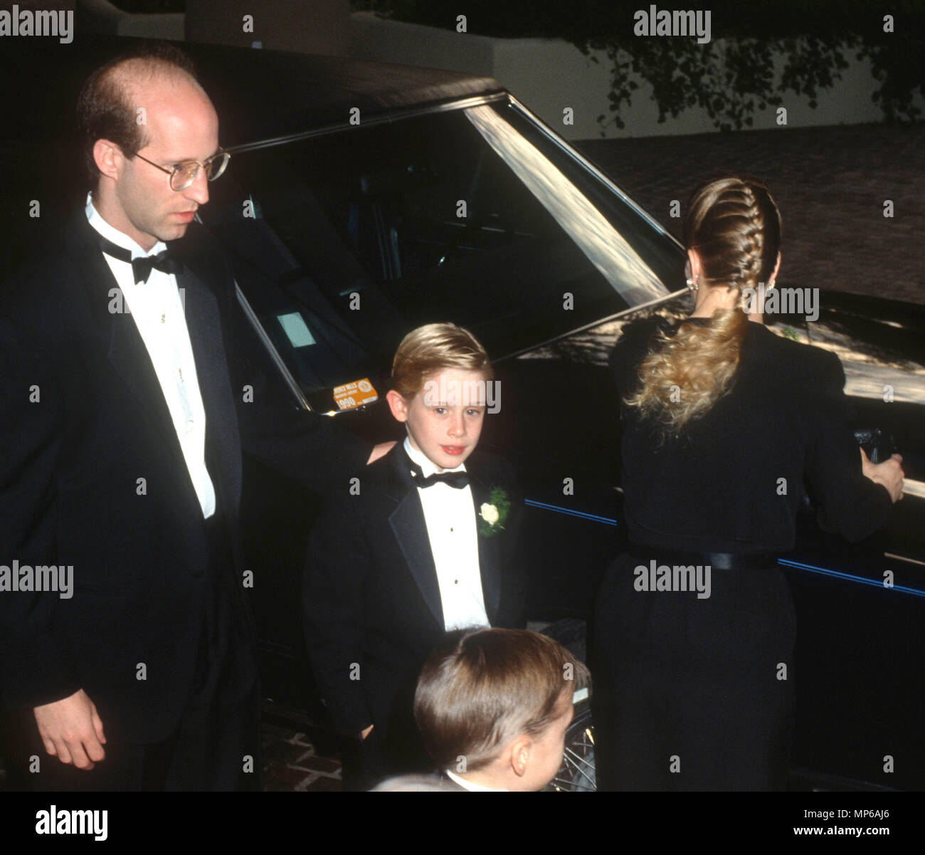 BEVERLY HILLS, CA - JANUARY 19: Actor Macaulay Culkin and family attend the 48th Annual Golden Globe Awards on January 19, 1991 at the Beverly Hilton Hotel in Beverly Hills, California. Photo by Barry King/Alamy Stock Photo Stock Photo