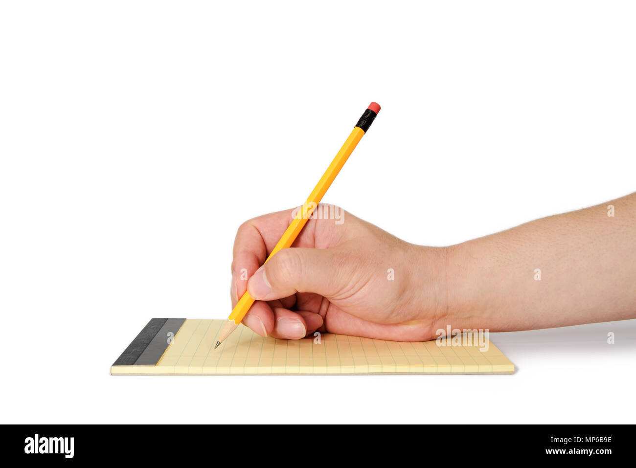 A man hand holding a pencil on top of notes. Stock Photo