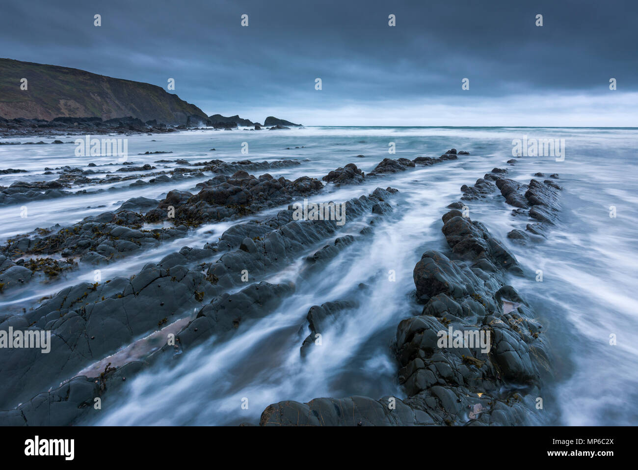 The rocky shore at Welcombe Mouth on the North Devon Heritage Coast, England. Stock Photo