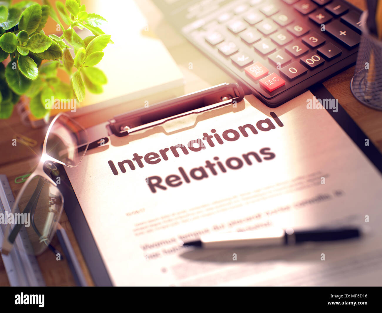 International Relations Concept on Clipboard. Stock Photo