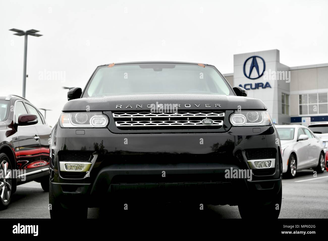 Black Range Rover for sale parked at the Annapolis Acura car dealership, MD, USA Stock Photo