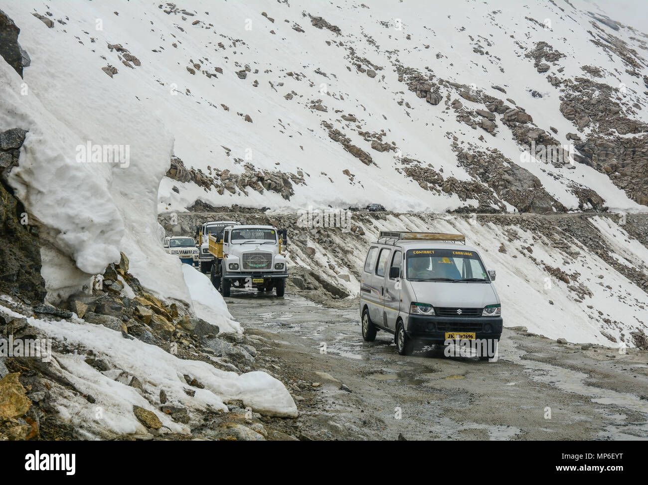 Ladakh, India Jul 18, 2015. Cars run on dangerous road in Ladakh